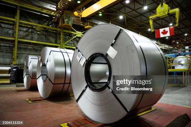 Spools of steel at an ArcelorMittal Dofasco facility in Hamilton, Ontario, Canada, on Wednesday, March 12, 2025. Canada will keep its trade...