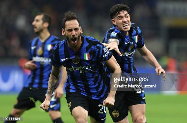 Hakan Calhanoglu of FC Internazionale celebrates after scoring their team's secon goal during the Serie A match between FC Internazionale and AC...
