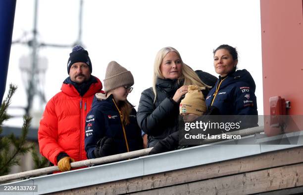 Haakon, Crown Prince of Norway, Victoria, Crown Princess of Sweden and Prince Oscar, Duke of Skane, watch the Cross-Country Women's Mass 50KM of the...