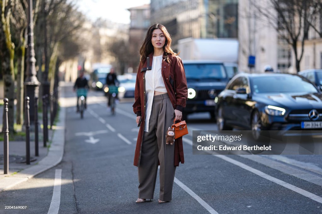Street Style - Paris Fashion Week - Womenswear Fall/Winter 2025/2026 - Day Six