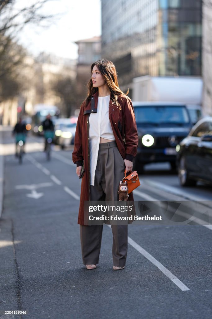 Street Style - Paris Fashion Week - Womenswear Fall/Winter 2025/2026 - Day Six