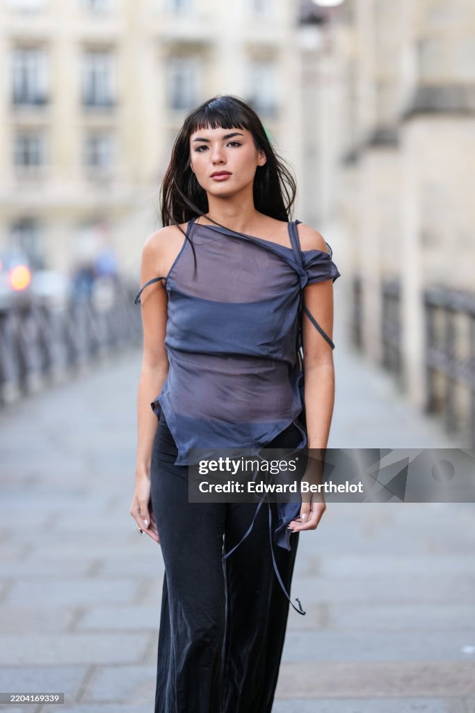 Street Style - Paris Fashion Week - Womenswear Fall/Winter 2025/2026 - Day Six