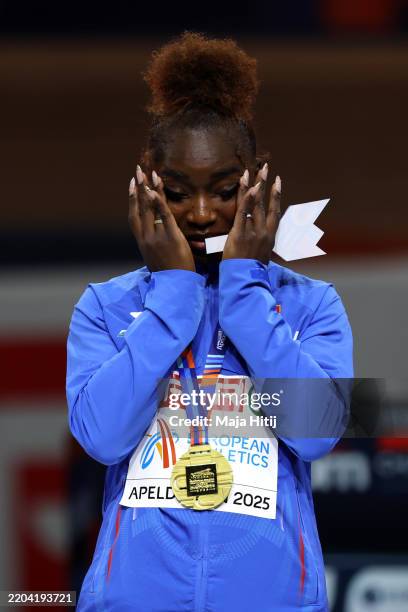 Gold medallist, Zaynab Dosso of Italy, reacts during the medal ceremony for the Women's 60m Final in the European Athletics Indoor Championships at...