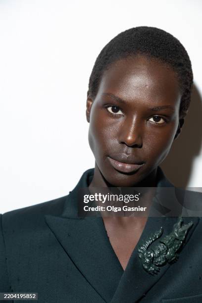 Model poses backstage prior to the Lacoste Womenswear Fall/Winter 2025-2026 show as part of Paris Fashion Week at Roland Garros on March 9, 2025 in...