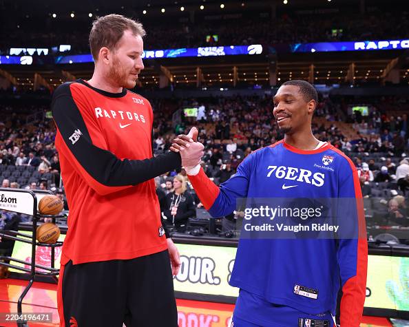 Jakob Poeltl of the Toronto Raptors and Lonnie Walker IV of the... News ...