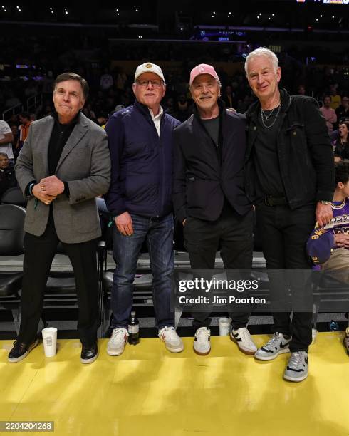 Bob Costas, David Zaslav, Don Johnson and John McEnroe attend a basketball game between the Los Angeles Lakers and the New York Knicks on March 6,...