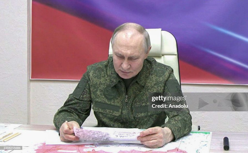 Russian President Putin visits Kursk in military uniform