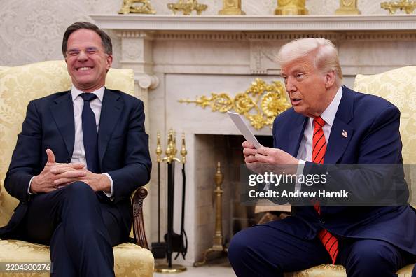 Mark Rutte Office Secretary General Mark Rutte laughs as U.S. President Donald Trump ...