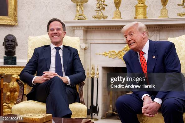 Mark Rutte Office Secretary General Mark Rutte laughs as U.S. President Donald Trump ...