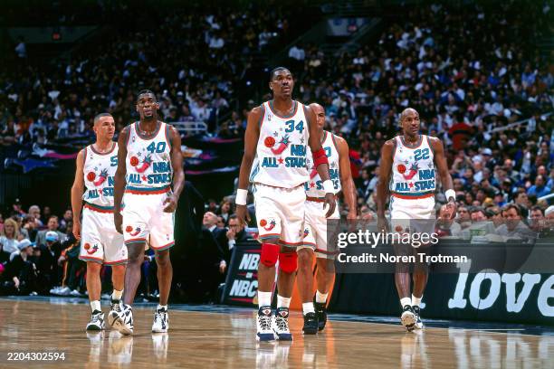 Jason Kidd, Shawn Kemp, Hakeem Olajuwon, Charles Barkley and Clyde Drexler of the Western Conference All-Stars line up during the 1996 NBA All-Star...