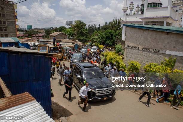 Presidential escort motorcade arrives in Kibera Slum during Kenya's President Dr. William Rutos visit on March 13, 2025 in Nairobi, Kenya. Kenya's...