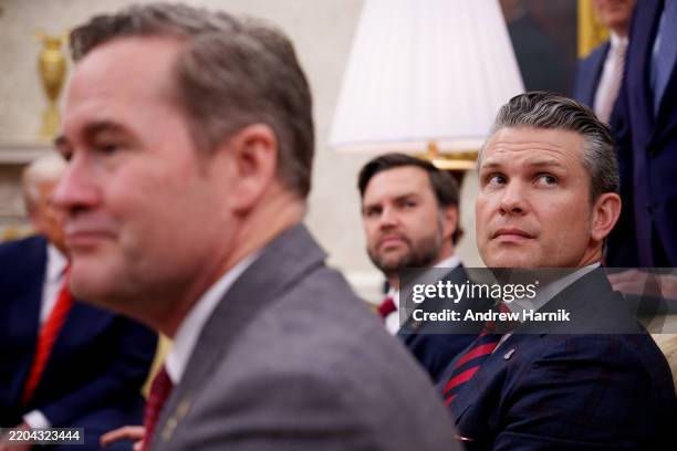 President Donald Trump, U.S. National Security Adviser Michael Waltz, U.S. Vice President J.D. Vance, and Defense Secretary Pete Hegseth, listen to a...