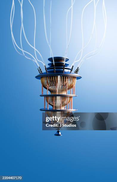 quantum connectivity: blue quantum computer with wires - quantencomputer stock-fotos und bilder