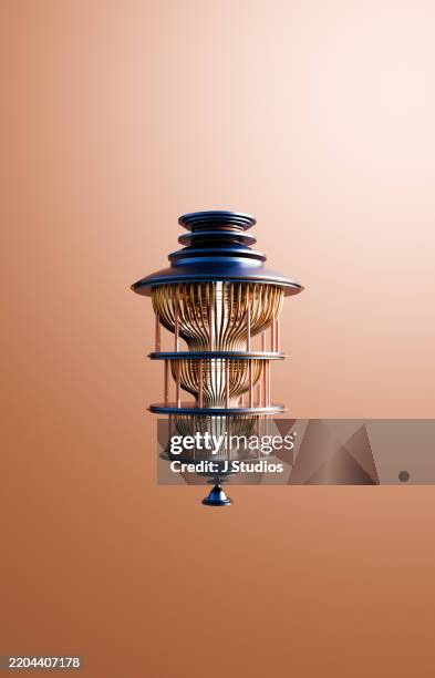 blue quantum computer against contrasting orange backdrop - quantencomputer stock-fotos und bilder