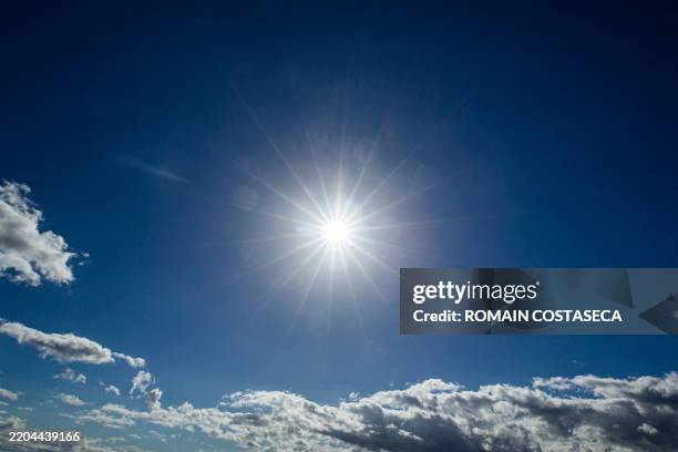 The sun shining brightly above a nearly cloudless sky in Clermont Ferrand France on October 16 2024.