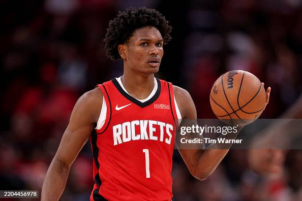 Houston Rockets Thompson Amen Thompson of the Houston Rockets brings the ball up court in the ...