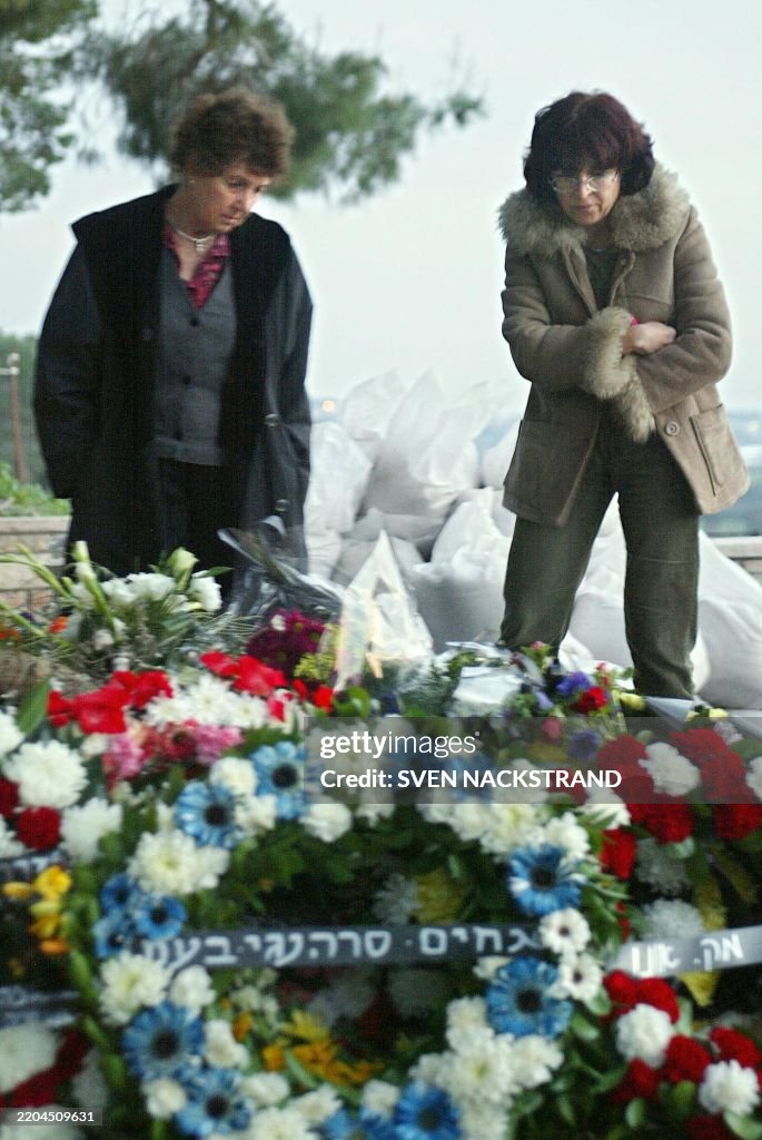 Illan Ramon Israeli women mourn by the fresh grave of Israeli astronaut Col. Ilan ...