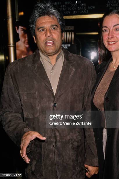 American actor Erik Estrada, wearing a brown suede jacket over a beige shirt, attends the Hollywood premiere of 'Houdini' at the El Capitan Theater...