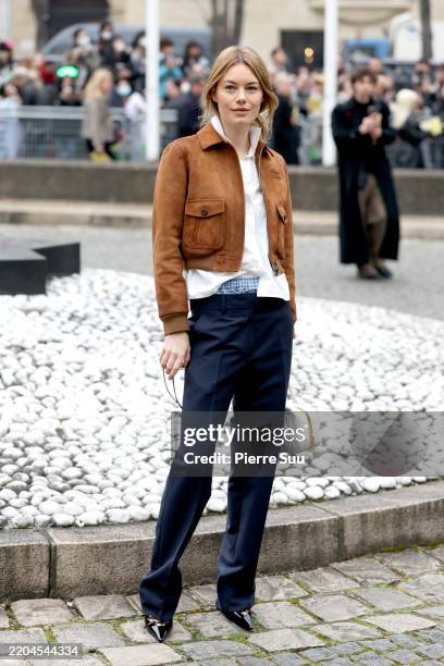 Camille Rowe attends the Miu Miu Womenswear Fall/Winter 2025-2026 show as part of Paris Fashion Week at Palais d'Iena on March 11, 2025 in Paris,...
