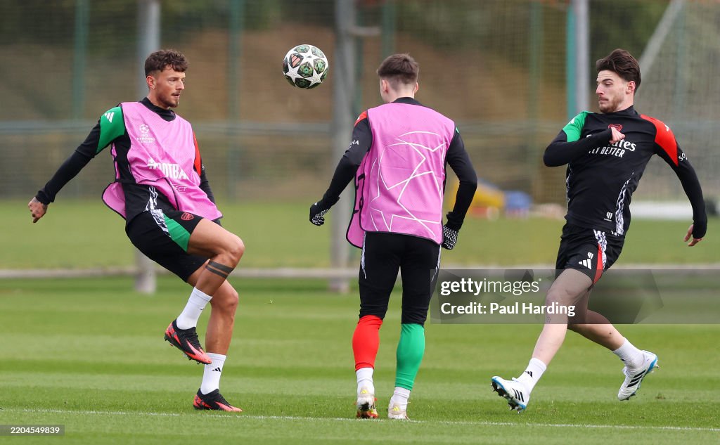 Arsenal Controls Ben White of Arsenal controls the ball alongside team mates Kieran ...
