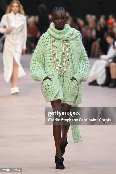 Model walks the runway during the Chanel Womenswear Fall/Winter 2025-2026 show as part of Paris Fashion Week at Grand Palais on March 11, 2025 in...