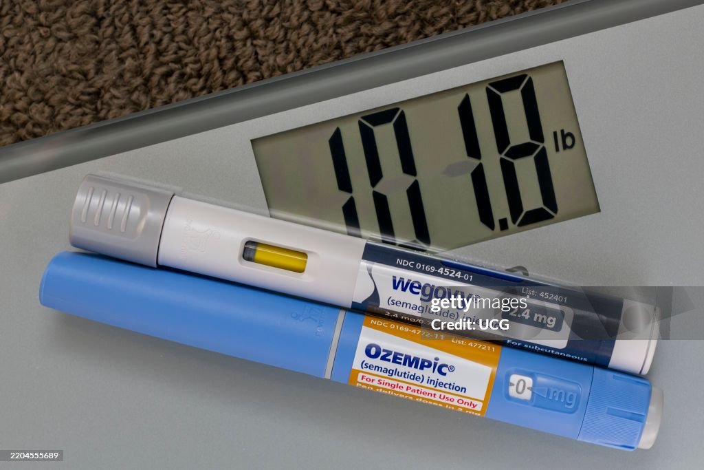 Still life of Ozempic and Wegovy with weight scale.