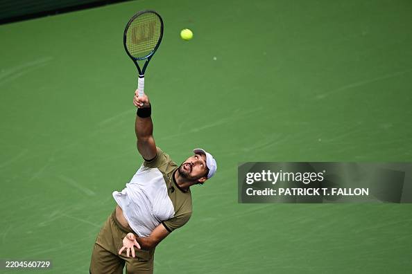 Anna Romboli Brazil's Fernando Romboli serves against USA's Sebastian Korda and ...