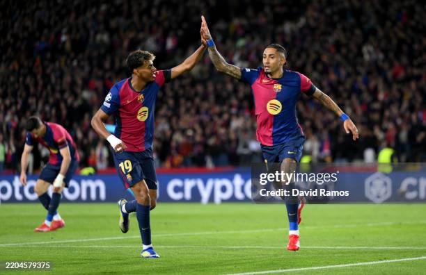Raphinha of FC Barcelona celebrates scoring his team's third goal with teammate Lamine Yamal during the UEFA Champions League 2024/25 UEFA Champions...
