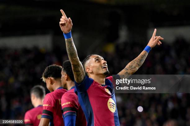 Raphinha of FC Barcelona celebrates scoring his team's third goal during the UEFA Champions League 2024/25 UEFA Champions League 2024/25 Round of 16...