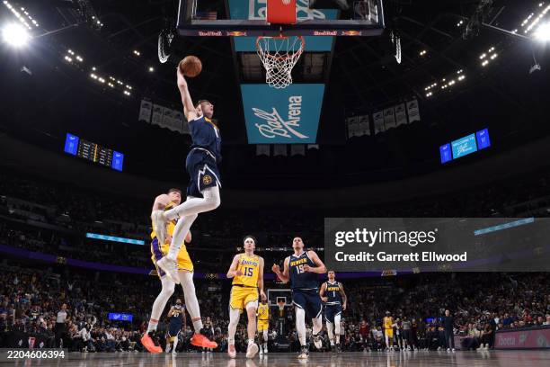 Christian Braun of the Denver Nuggets dunks the ball during the game against the Los Angeles Lakers on March 14, 2025 at Ball Arena in Denver,...