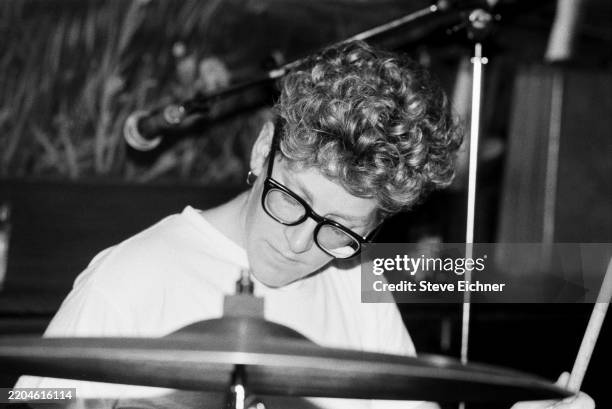 American Pop & Punk musician Heather Lewis, of the group Beat Happening, plays drums as she performs onstage at Wetlands, New York, New York, October...