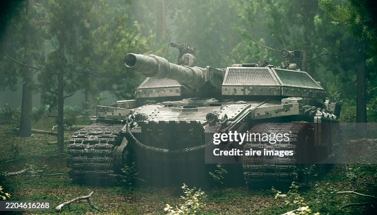 Military tank hiding in the forest Military tank hiding in the forest