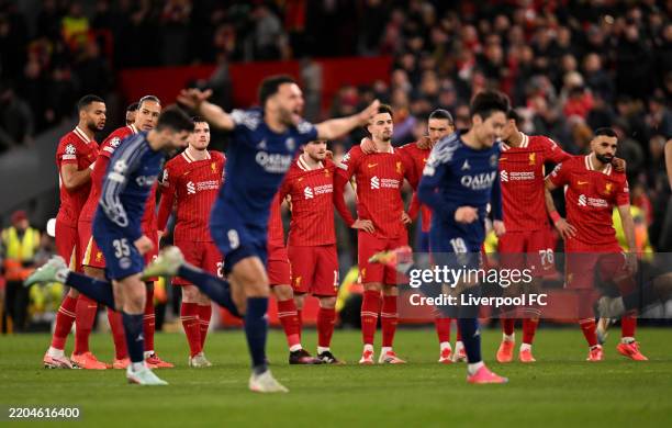 Players of Liverpool look dejected after losing a penalty shoot out in the UEFA Champions League 2024/25 Round of 16 Second Leg match between...