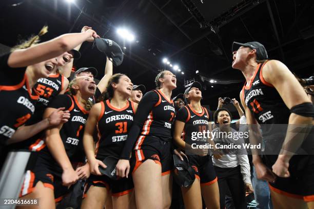 The Oregon State Beavers celebrate defeating the Portland Pilots 59-46 in the championship game of the West Coast Conference women's basketball...