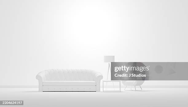 minimalist all-white living room with open negative space - simple living stock pictures, royalty-free photos & images