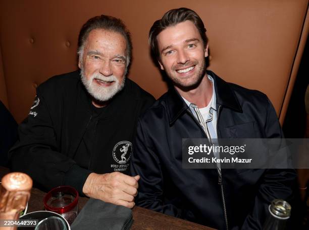 Arnold Schwarzenegger and Patrick Schwarzenegger attend the Grand Opening of the brand new Planet Hollywood NYC hosted by Robert Earl, Alec & Hilaria...