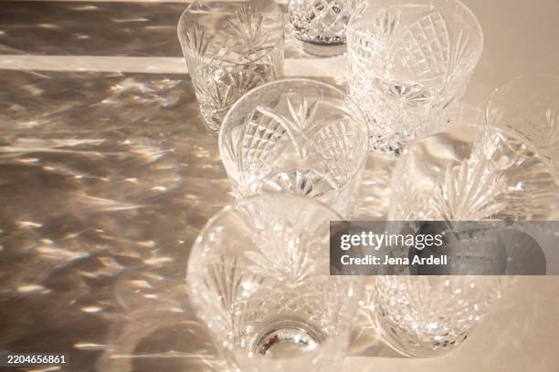 fancy drinking glasses, crystal glassware, leaded glassware empty glasses - kristallglas stock-fotos und bilder