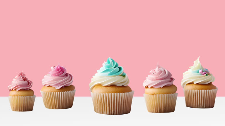 https://media.gettyimages.com/id/2204665707/video/cupcakes-animation-muffin-set-sliding-on-the-table-with-pink-background-pastry-shop-promo.jpg?b=1&s=640x640&k=20&c=sjt3XWoSutOvVVDRQrcRth1okKrTaeBuHwTqcD5A5dM=