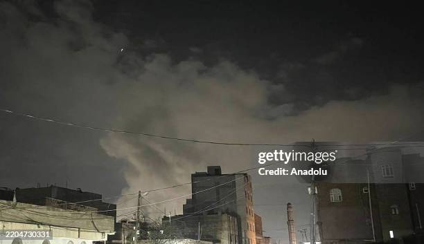 Smoke rises after the American-Israeli aircraft launched a series of airstrikes on the capital, Sanaa, Yemen on March 15, 2025. US President Donald...