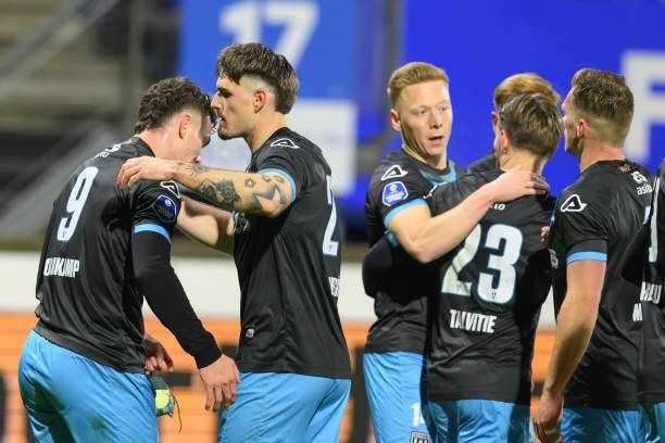 Heracles players advance the 0-1 by Jizz Hornkamp of Heracles Almelo during the Dutch Eredivisie match between SC Heerenveen and Heracles Almelo at...