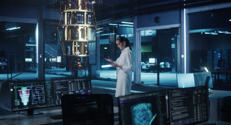 https://media.gettyimages.com/id/2204753680/video/female-quantum-machine-learning-engineer-in-a-lab-coat-walking-up-to-a-quantum-processor-in.jpg?b=1&s=640x640&k=20&c=Oywc2pRewRwtufGmz8-KRhlLfaC0vLb7W7GwwvI9JBY=