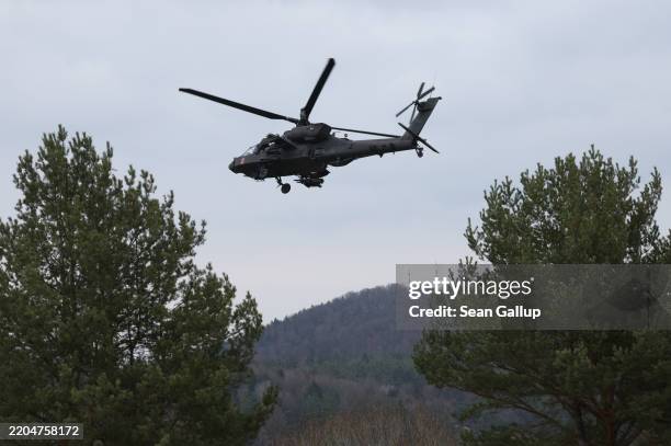 Boeing AH-64 Apache attack helicopter of the U.S. Army 12th Combat Aviation Brigade participates in the Allied Spirit 25 military exercise at the...