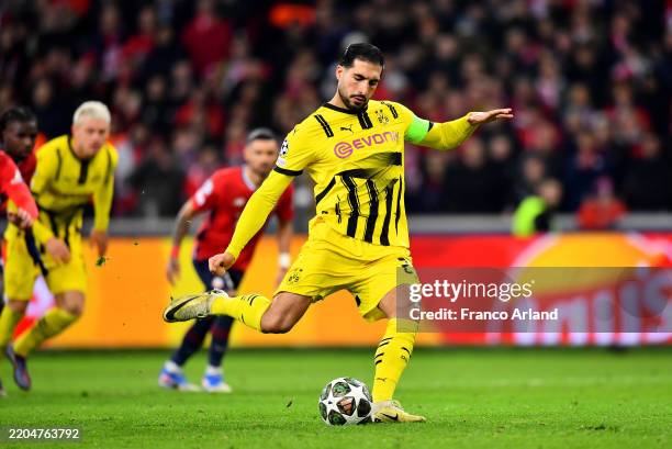 Emre Can of Borussia Dortmund scores his team's first goal from the penalty spot during the UEFA Champions League 2024/25 Round of 16 Second Leg...