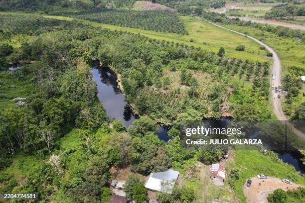This aerial view shows an oil spill at the Caple River in El Vergel, province of Esmeraldas, Ecuador on March 15, 2025. The damage to an oil...