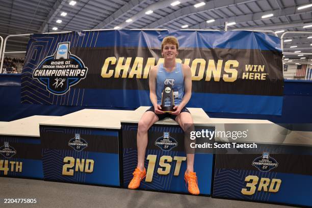 Ethan Strand of North Carolina Tar Heel poses after winning the Men's 3000 meter final during the Division I Men's and Women's Indoor Track and Field...