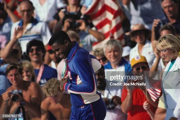 At the 1984 Olympics, held in Los Angeles, CA, athletic Carl Lewis won the Gold medal in the 100m, the 200m, the long jump, and the 4x100m relay .