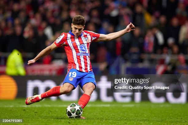 Julian Alvarez of Atletico de Madrid scores the team's second penalty in the penalty shoot out, disallowed after a VAR review during the UEFA...
