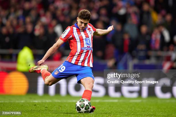 Julian Alvarez of Atletico de Madrid scores the team's second penalty in the penalty shoot out, disallowed after a VAR review during the UEFA...