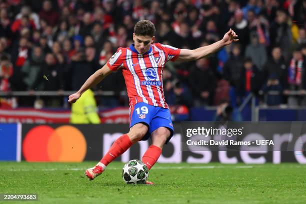 Julian Alvarez of Atletico de Madrid scores the team's second penalty in the penalty shoot out, which is later ruled out following a VAR Review due...