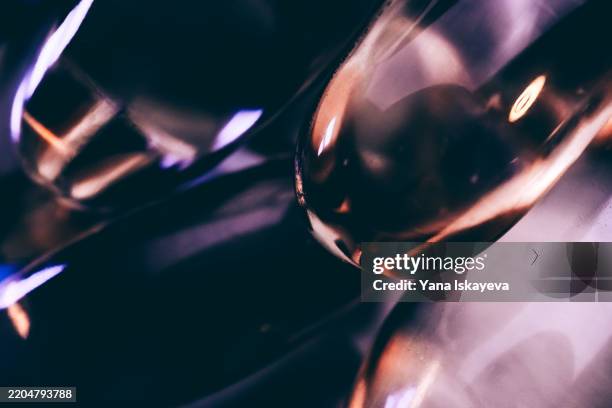 futuristic abstract macro view of supplements with professional lighting in vibrant colors - black vinyl texture stock pictures, royalty-free photos & images